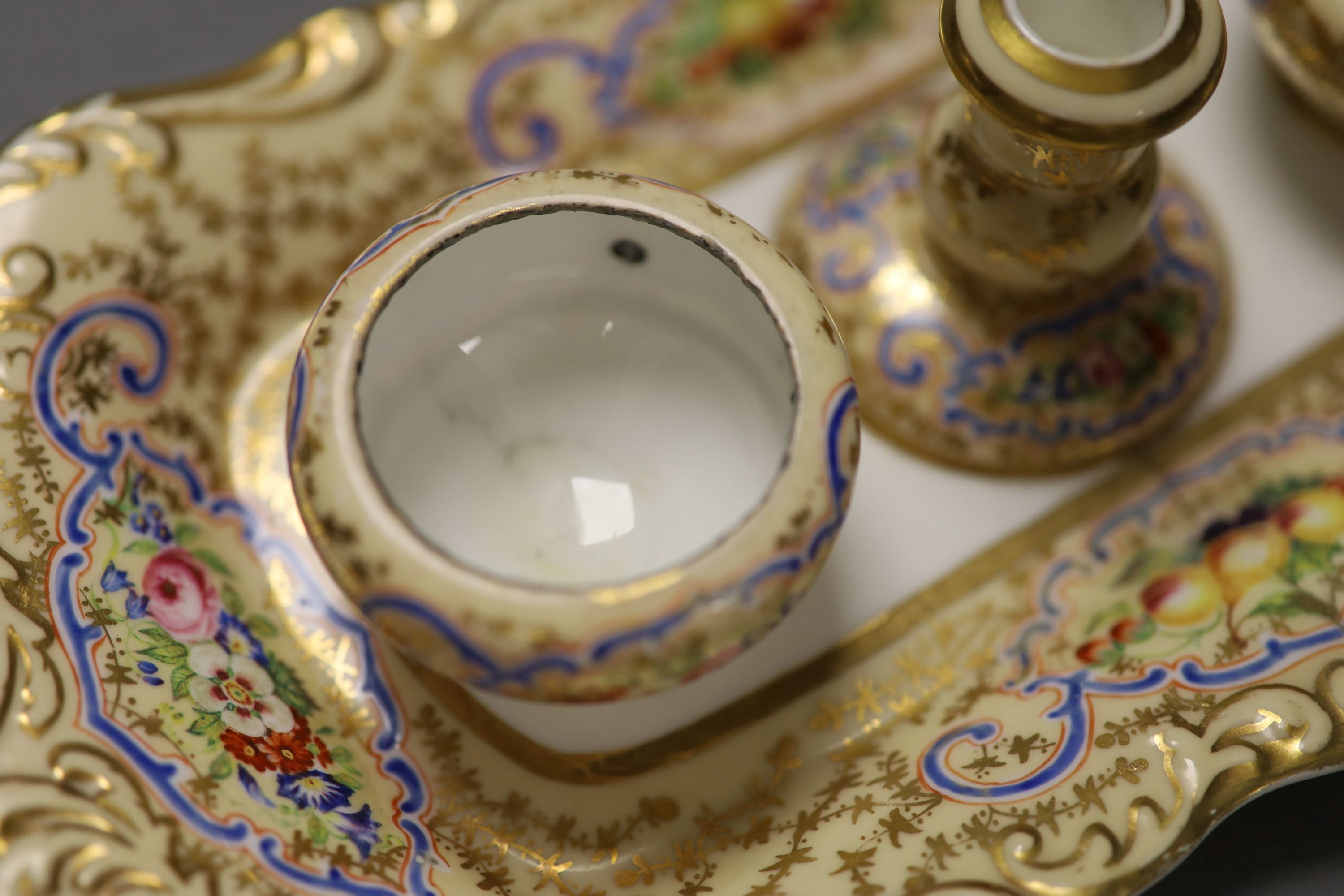 A Copeland and Garrett inkstand with fixed pots and candlestick and two covers,